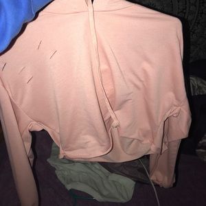 cropped pink ripped hoodie
